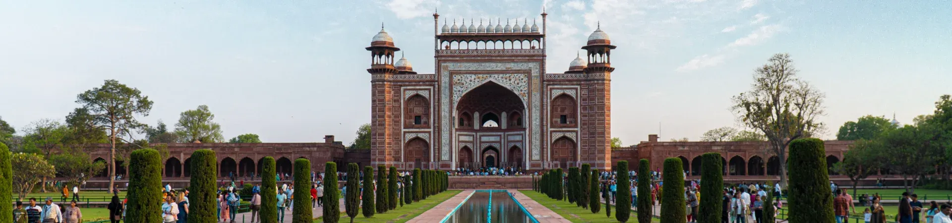 Intricate marble inlay details and gardens of Taj Mahal